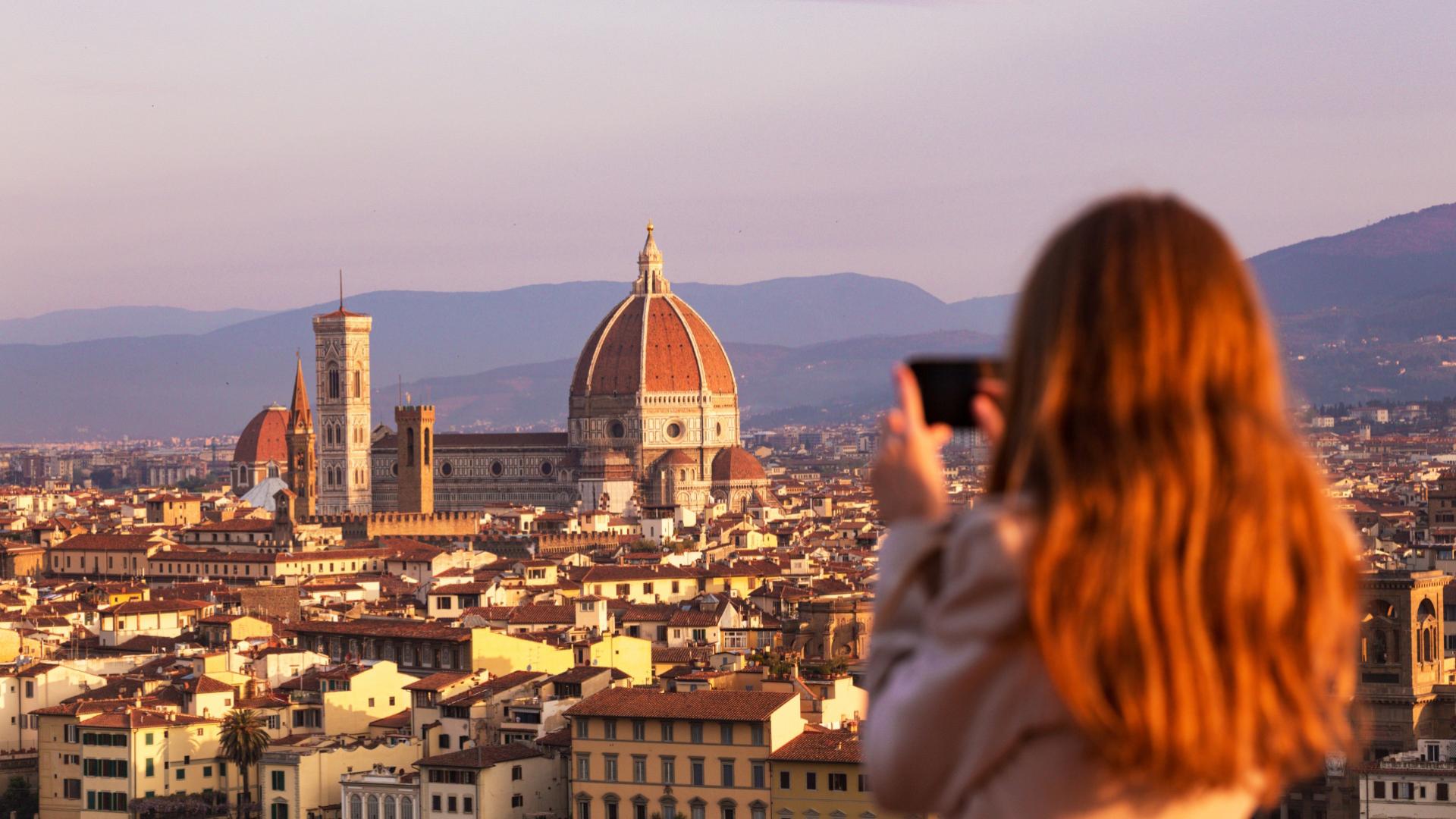 Florence skyline with the Duomo at sunset.